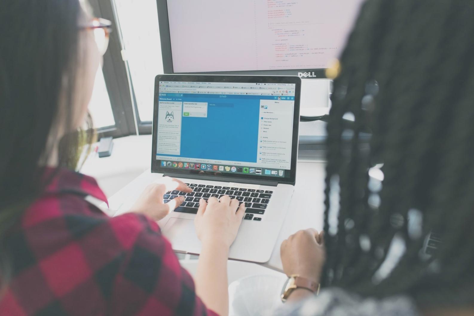 Participant working through an AI-assisted design project during a Warm Corner session